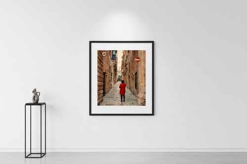 Lady in St Frederick Street, Valletta framed on wall